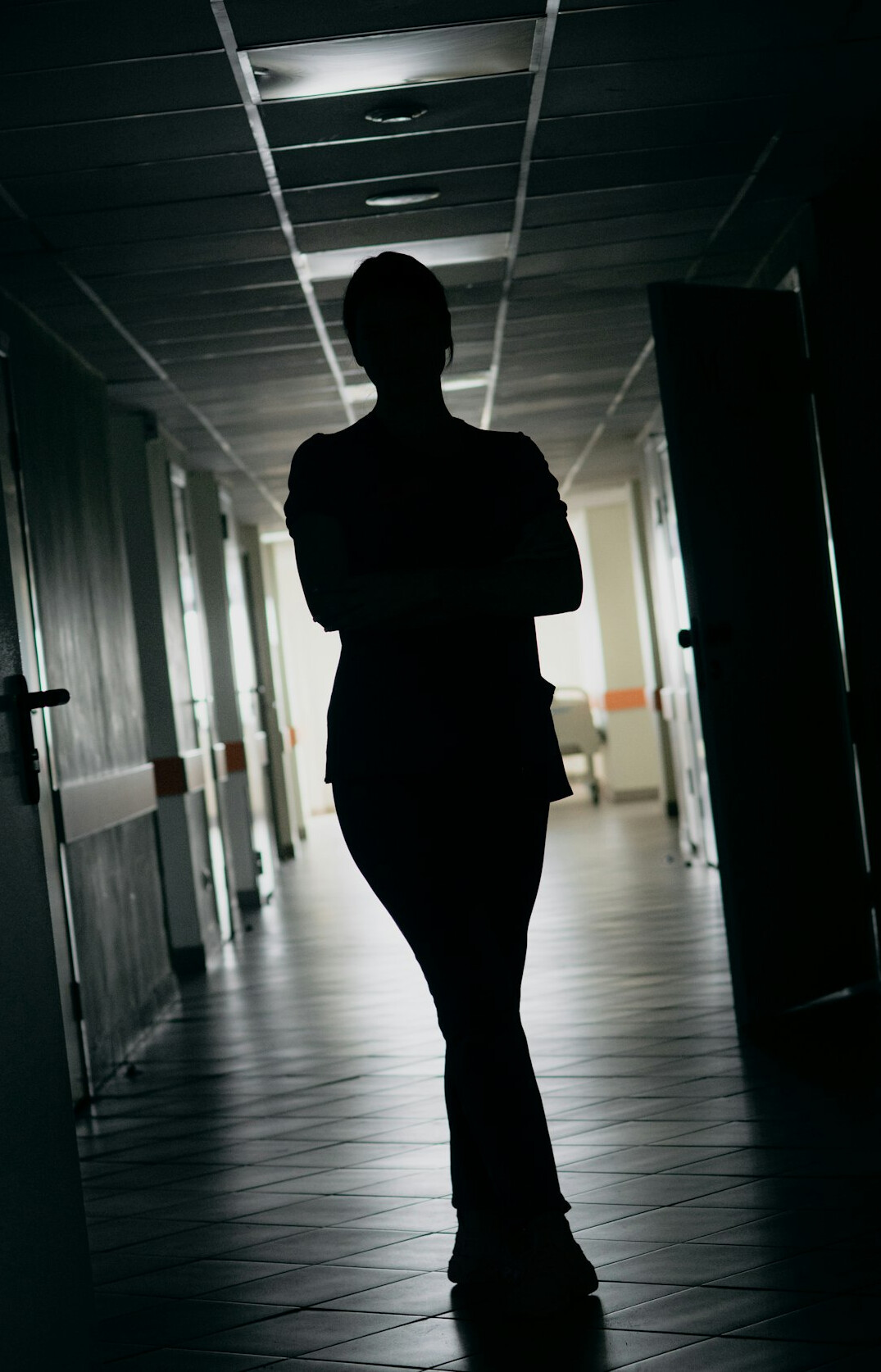 shadowy figure in hallway