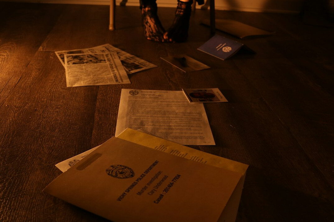 detective examining crime scene